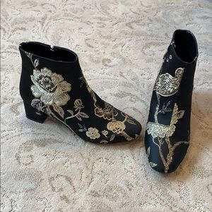 French Blu black and gold boots.